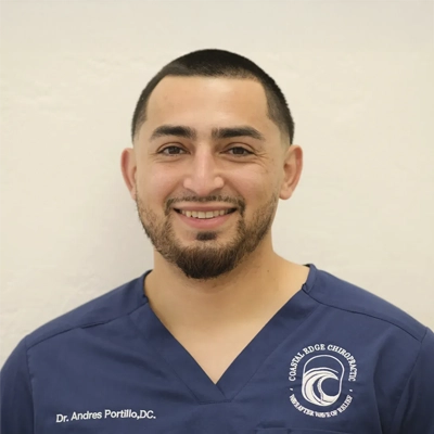 A headshot of Dr. Andres Portillo, a chiropractor at The Coastal Edge Chiropractic.